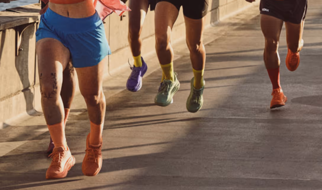 runners wearing colorful hoka sneakers