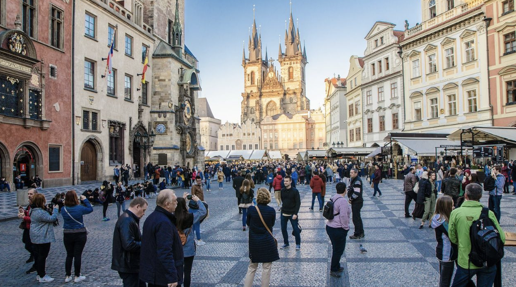locals and travelers -- experienced, and those traveling solo for the first time -- checking out a popular tourist destination