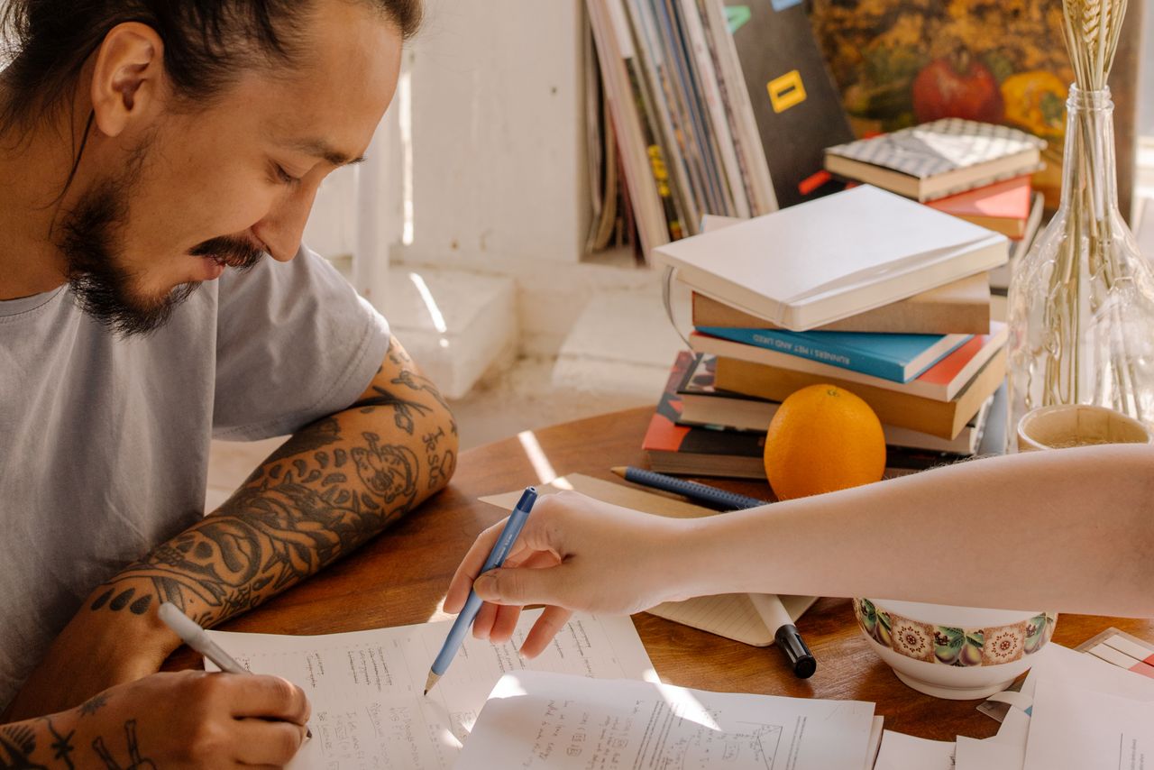 man works with a tutor on the worthwhile pursuit of learning spanish as an adult