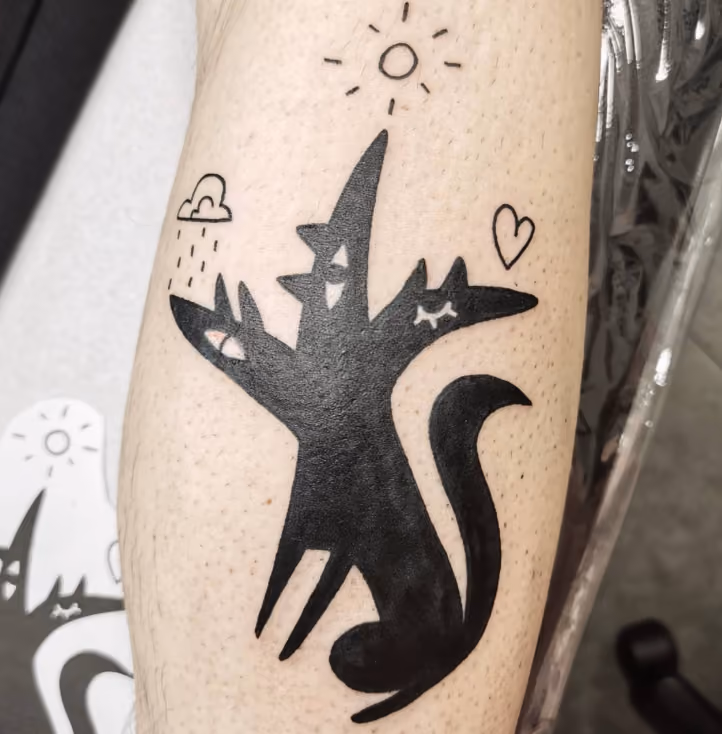tattoo of a three headed dog with a different doodle style symbol over each head, a raincloud, a sunshine, and a heart representing different emotions contained within one being