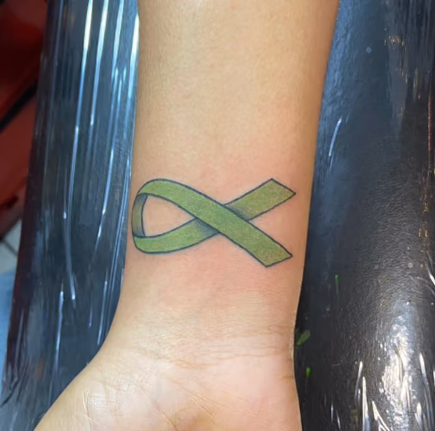 green mental health awareness/suicide prevention ribbon tattoo