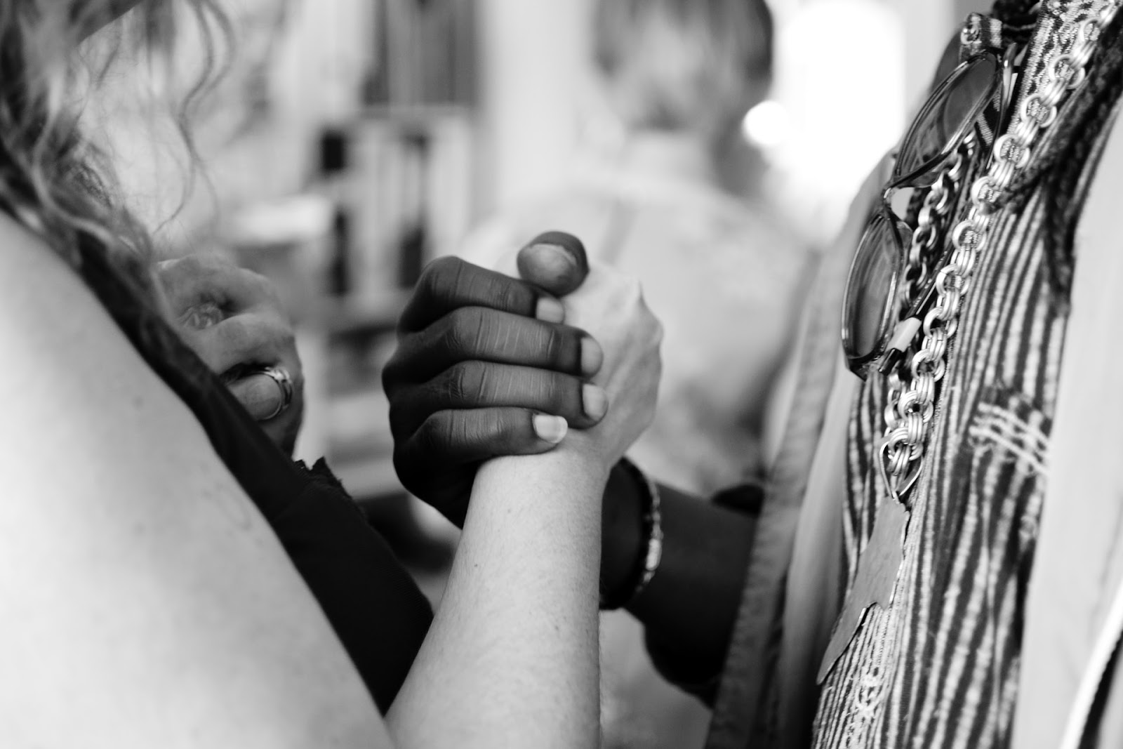 A couple holding hands.