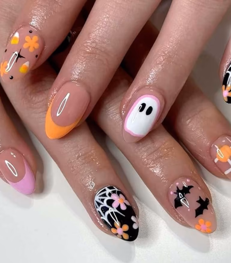 cute ghost and candycorn French tip nails perfect for Summerween