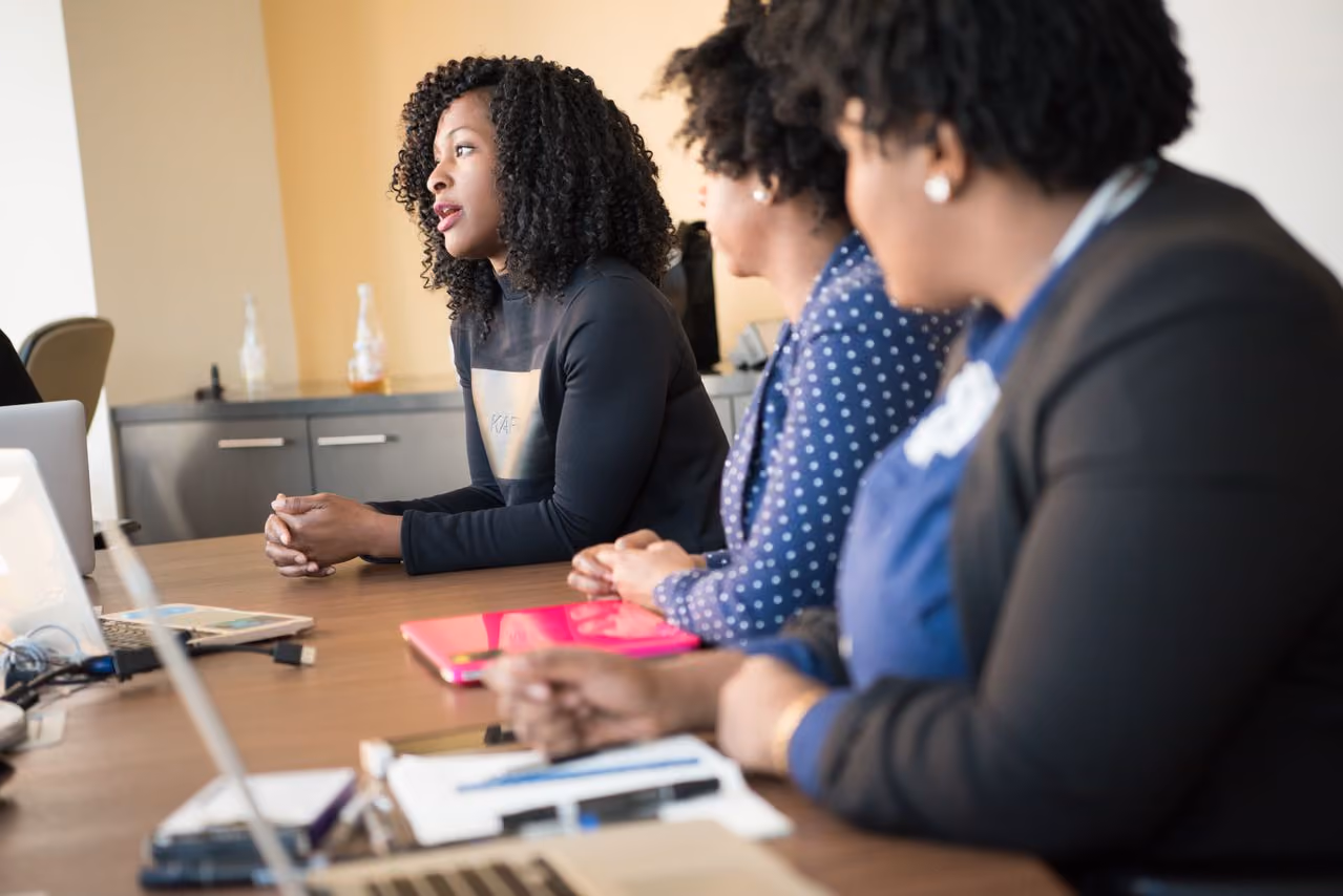 woman participating in a meeting, wondering if she's burnt out or should switch careers