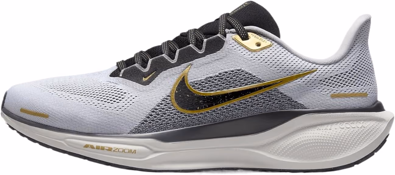 Nike Pegasus shoes in black and gold