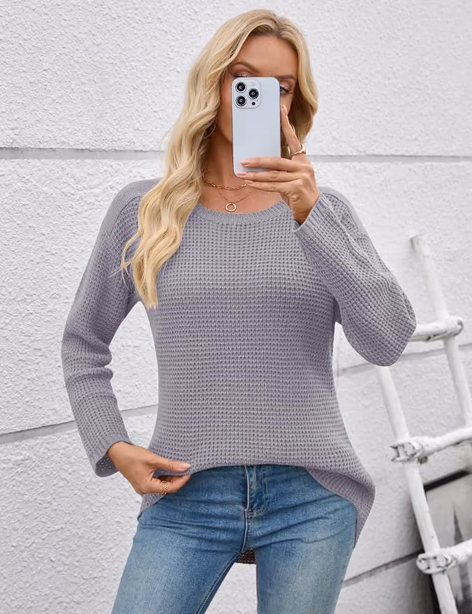 woman wearing a cozy but elegant alternative for designer athleisure sweaters from Vuori