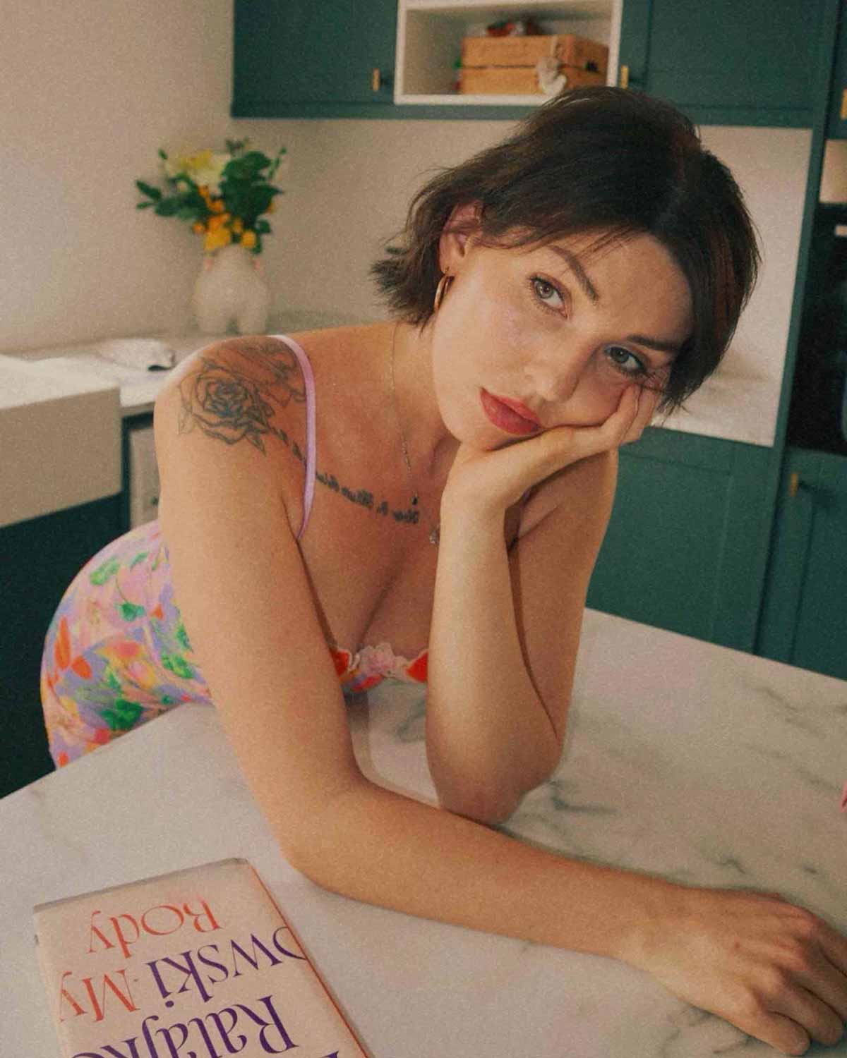 Gia in the kitchen with short hair, glowing skin, and a soft smile – capturing natural elegance in everyday life.