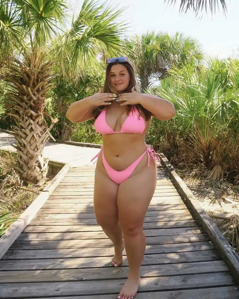 Courtney Faith dancing outdoors in Orlando, celebrating body positivity and freedom of expression