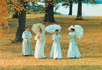Scene from Cries and Whispers depicting dying Agnes in her Swedish mansion, visited by her distant sisters as long-buried resentments and grief surface in the face of impending loss.