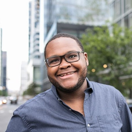 A headshot of Kipaya Kapiga