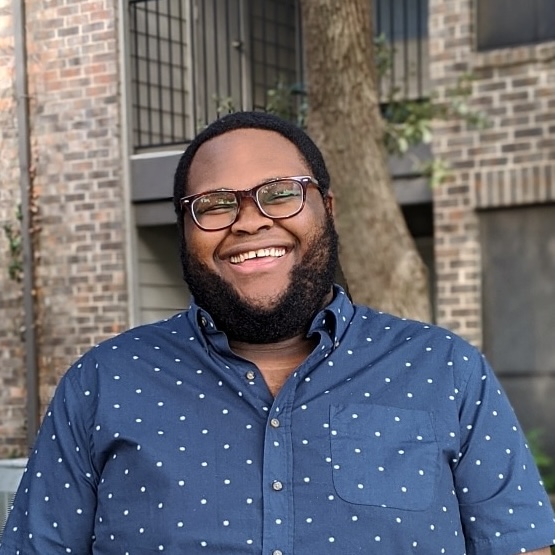 A headshot of Kipaya Kapiga