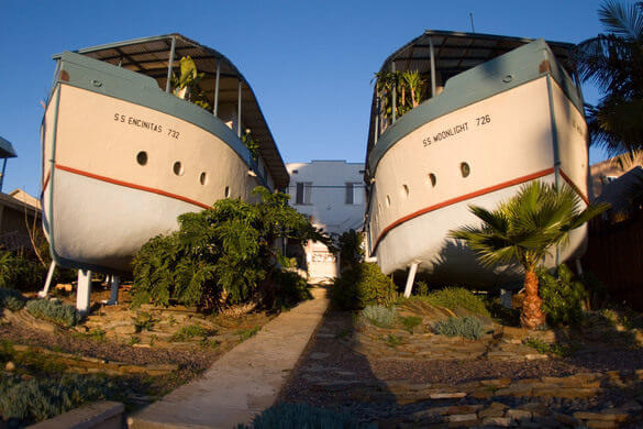 Two boathouses viewed from the street