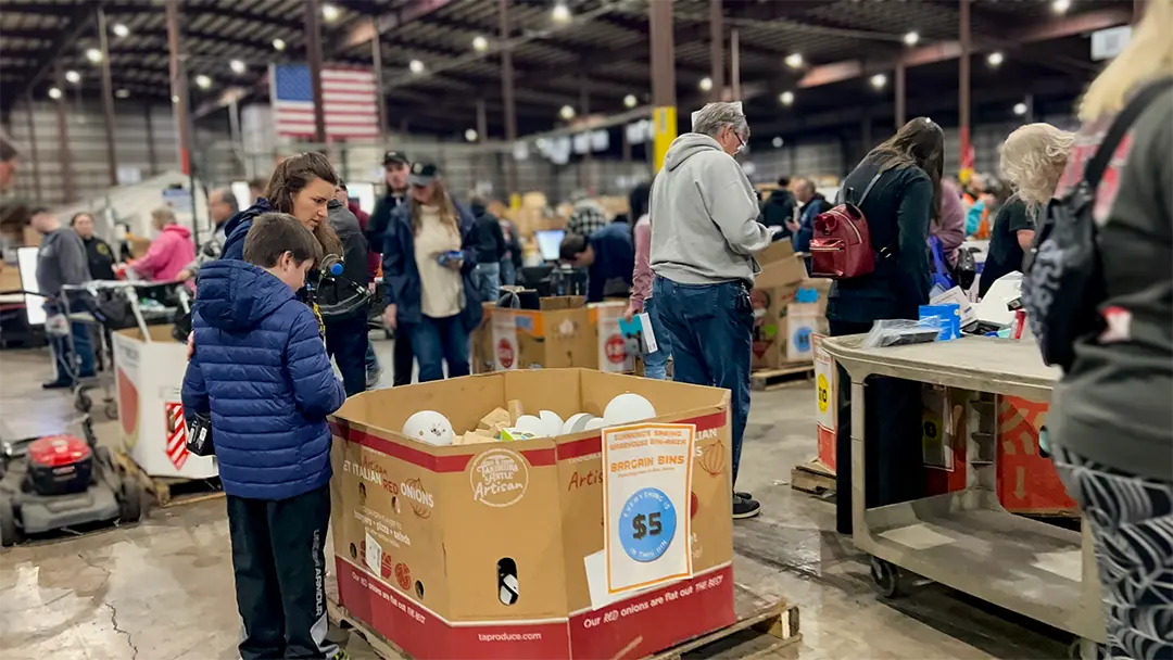 Sunnking customers browsing the variety of electronics during the Bin-anza Sale.