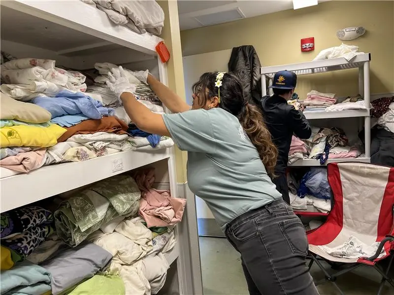 Sunnking Employees helping out in the laundry room during United Way Day of Caring, volunteering at the House of Mercy in 2025.