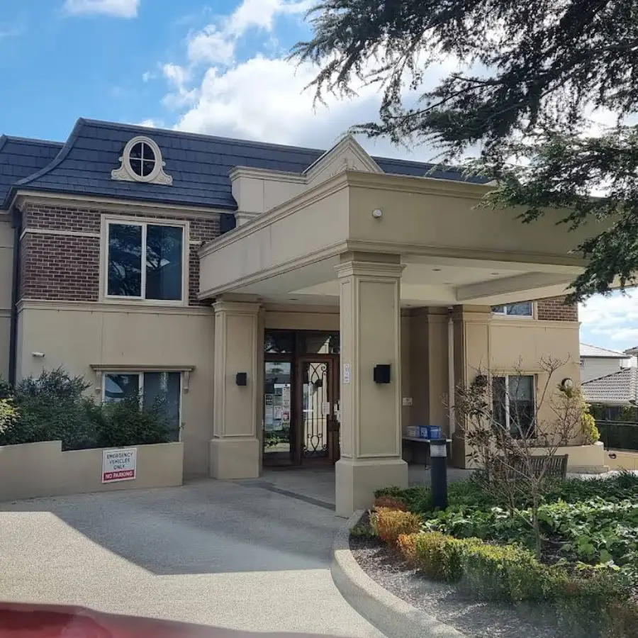 Front view of our Ashburton aged care residence, surrounded by well-kept gardens.