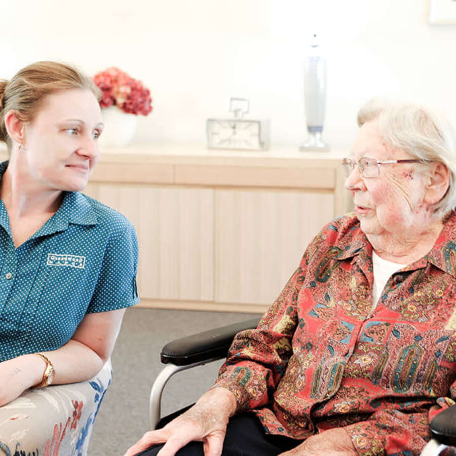 Resident receiving one-on-one support at Greenwood Manor, a retirement home in Braeside with a warm, community feel.