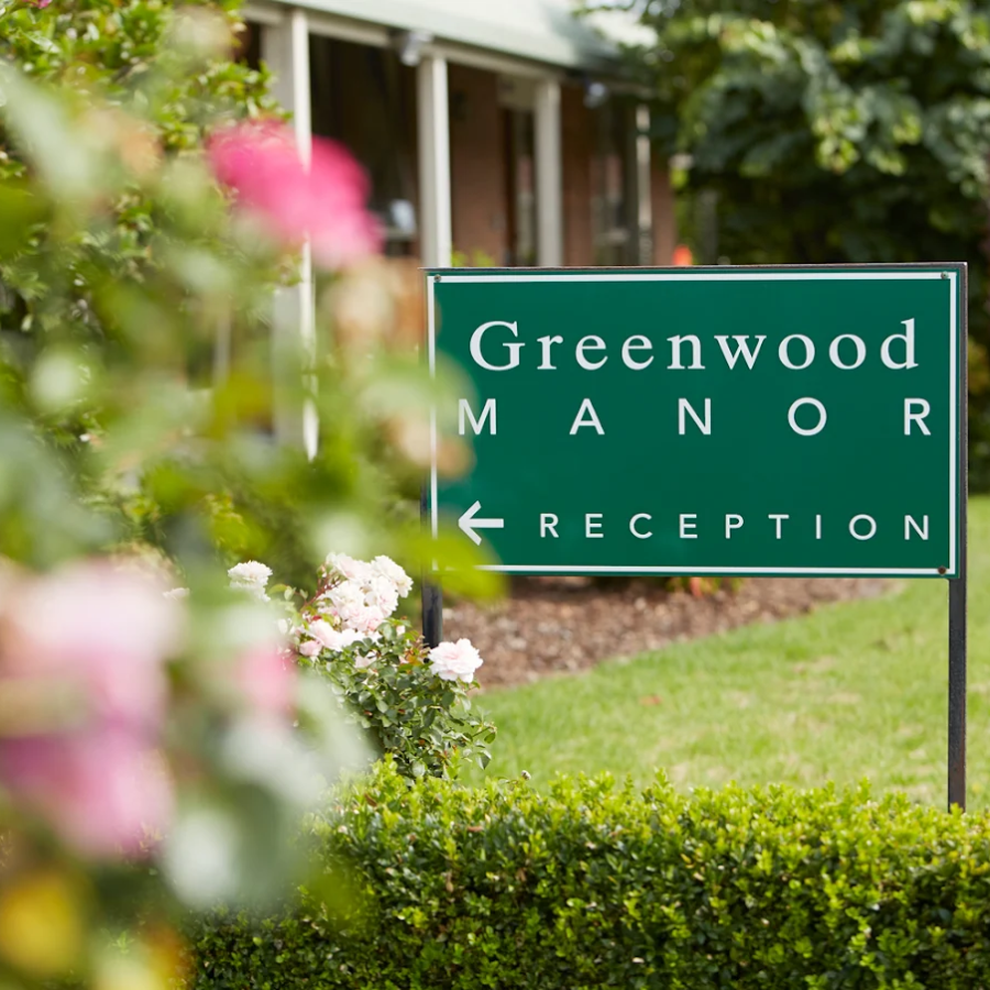 Reception sign at Greenwood Manor, a nursing home in Bangholme providing personalised residential aged care.