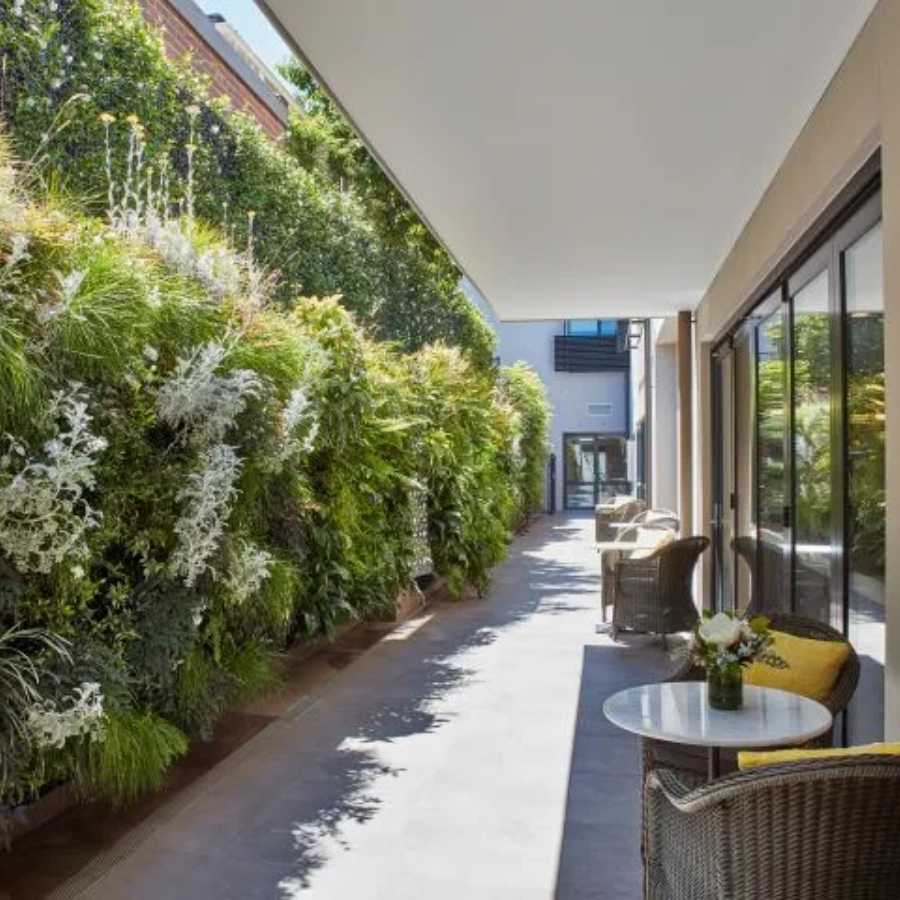 Peaceful outdoor walkway and garden at MACG, supporting wellbeing for aged care residents in Heatherton.