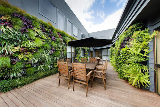 The tranquil vertical garden courtyard at our Keysborough aged care facility, enjoyed by many residents.