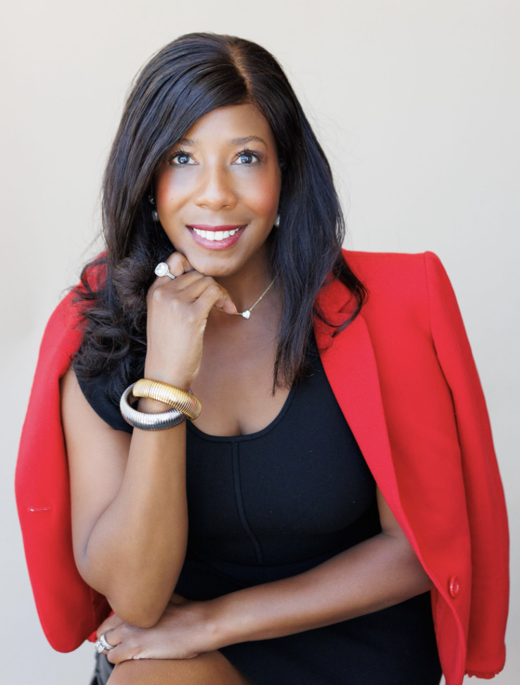bio photo of dr. christina madison in red jacket headshot
