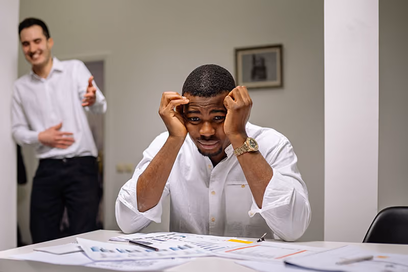 Disengaged employee at his desk.