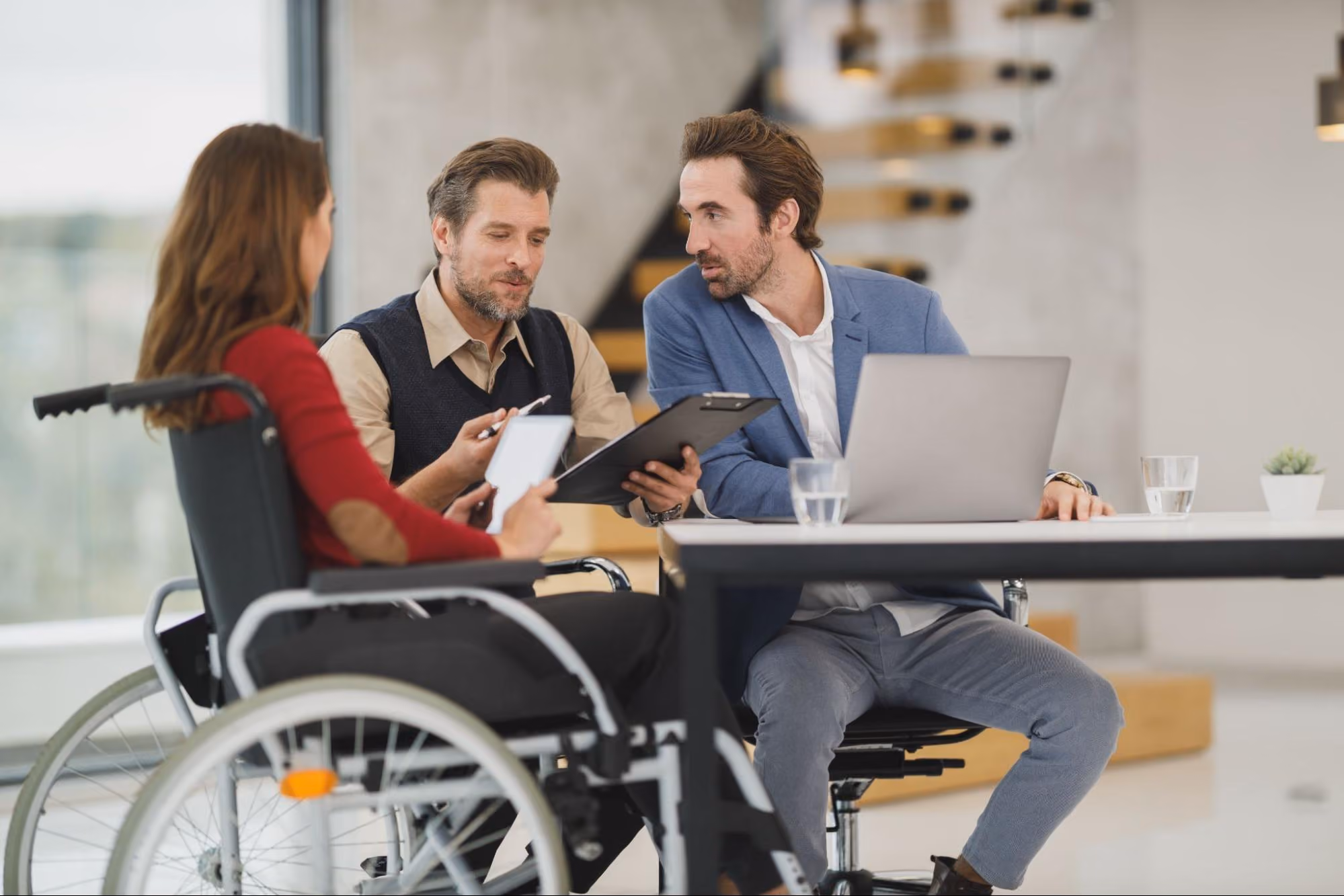 Employees meet about a project.