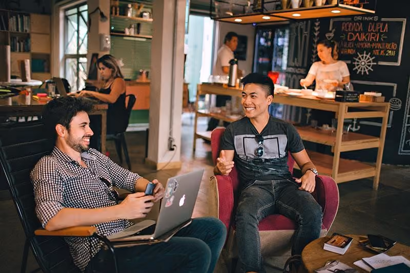 A manager giving verbal recognition to an employee for good performance.