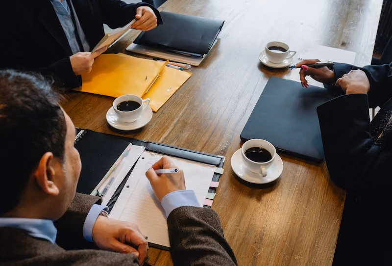 HR professionals write guides and notes for initiatives.