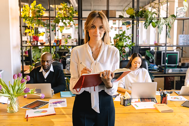 A recruiter preparing interview questions for candidates.