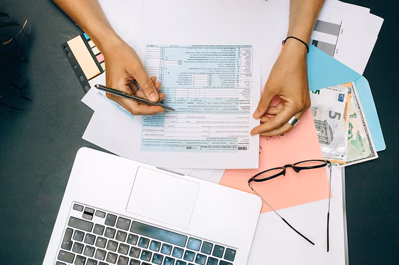 A digital nomad completing a tax submission.