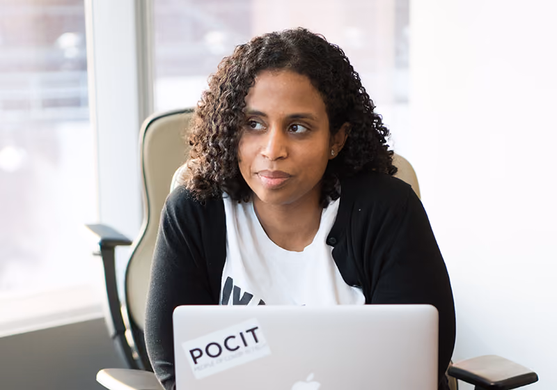 A recruiter considering a candidate's resume with some skepticism.