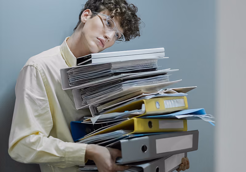A worker is depressed and overburdened with work after his employer laid off his colleagues.