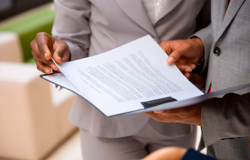 A recruiter reading an HR cover letter written by a job applicant.