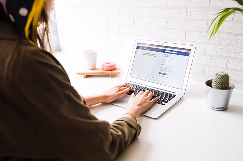 A recruiter logging into Facebook to screen candidates they've identified for passive recruitment to fill a vacancy.