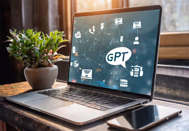 A laptop on a desk showing a GPT interface where HR professionals can interact with AI