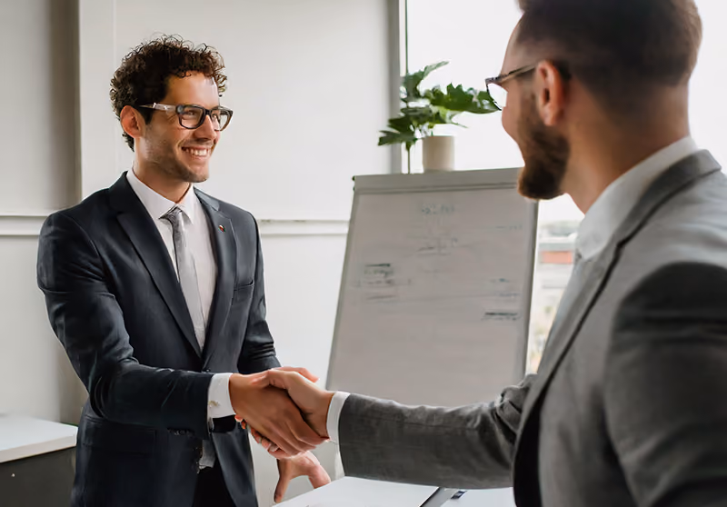 A manager thanking an employee for his hard work and loyalty to the organization.