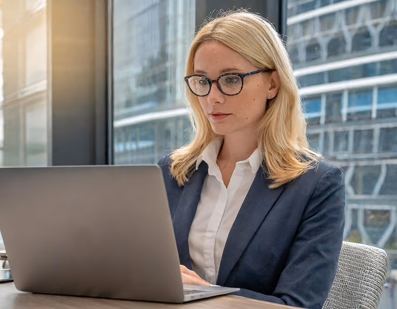 An HR manager reviewing employee turnover data to establish benchmarks and identify trends.