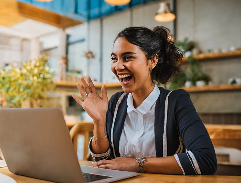 A remote manager giving a shout-out to a team member during a virtual meeting.