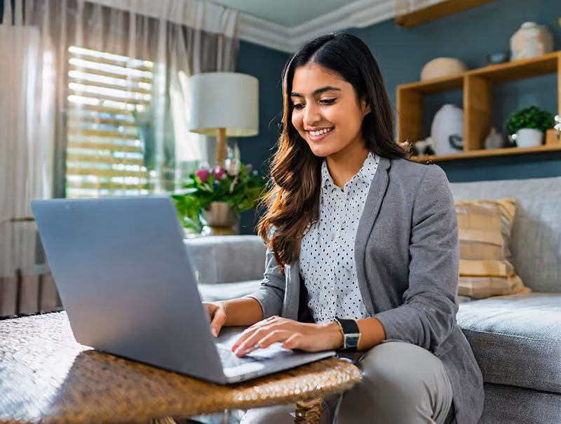 An HR professional preparing for a job interview by researching the company.