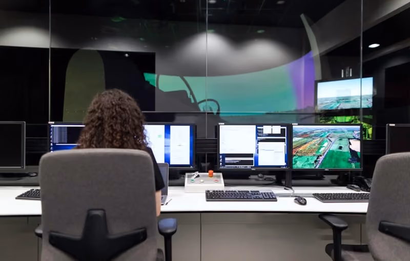 a tech employee working on a computer