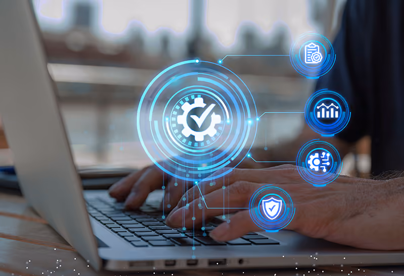 An HR professional uses a laptop to customize the workflow of their ATS system.