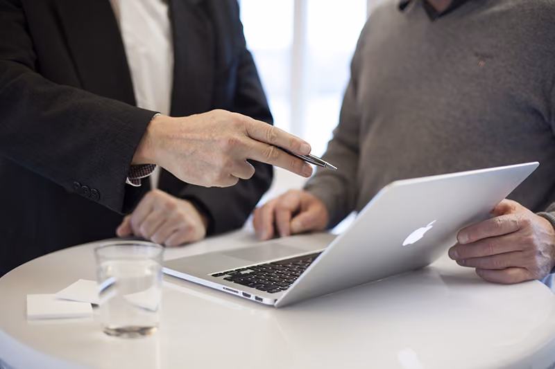 HR software buyer explaining customization needs to a vendor.