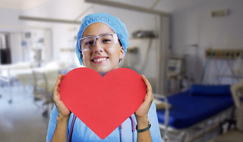 Nurse receiving employee rewards and recognition.