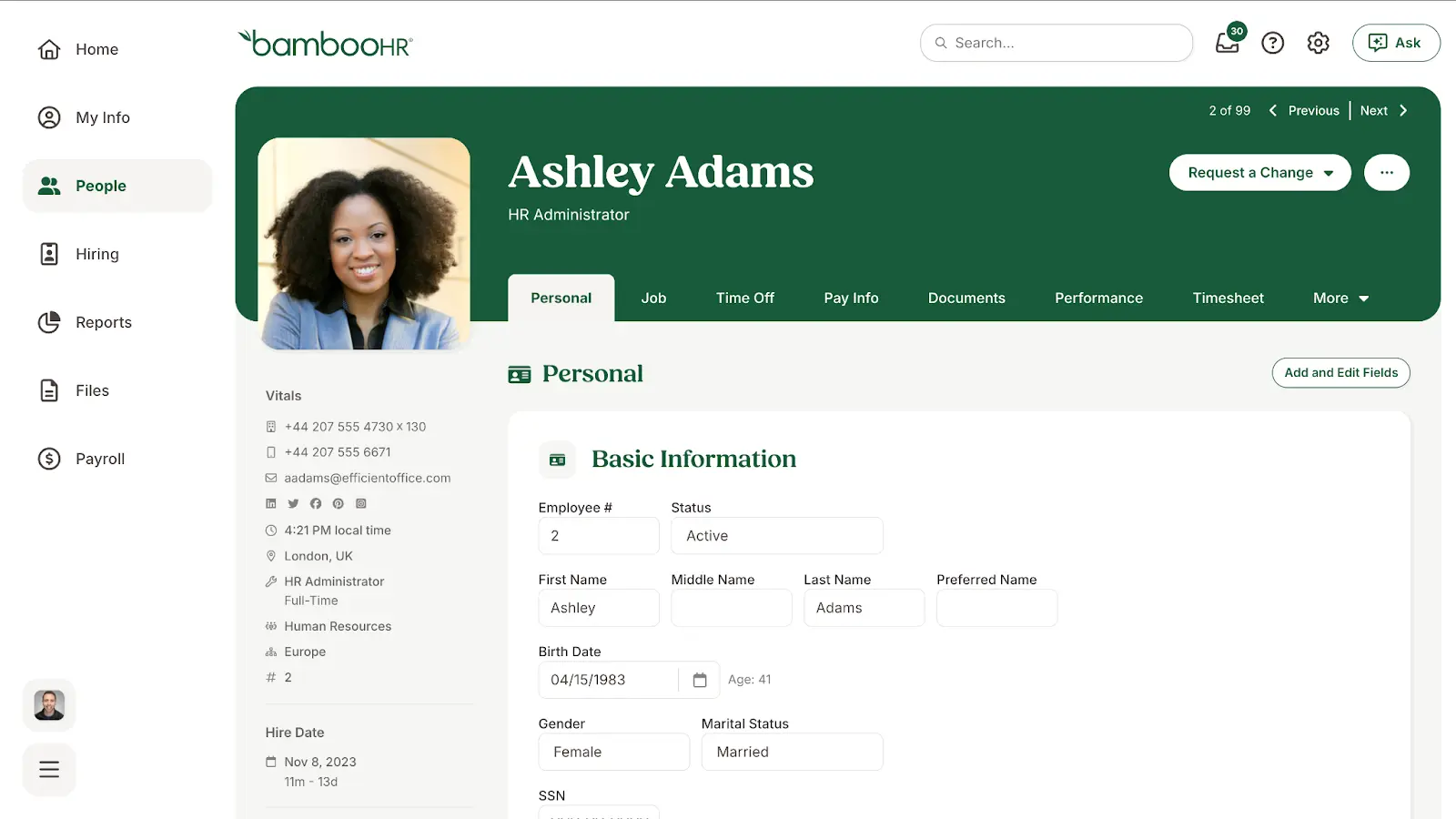 BambooHR displays an employee profile for Ashley Adams, including a professional headshot and basic contact information.