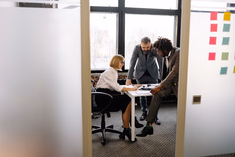 Three employees working together