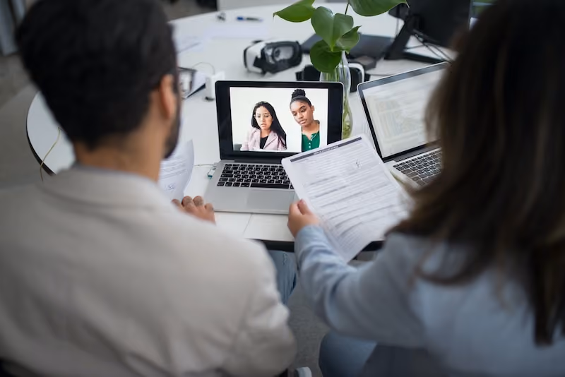Two candidate going through a virtual interview process