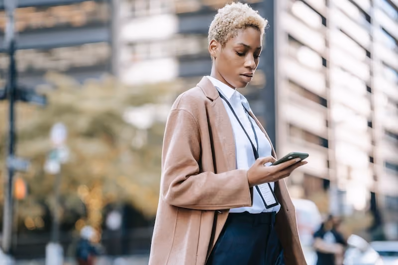 A woman using her mobile device