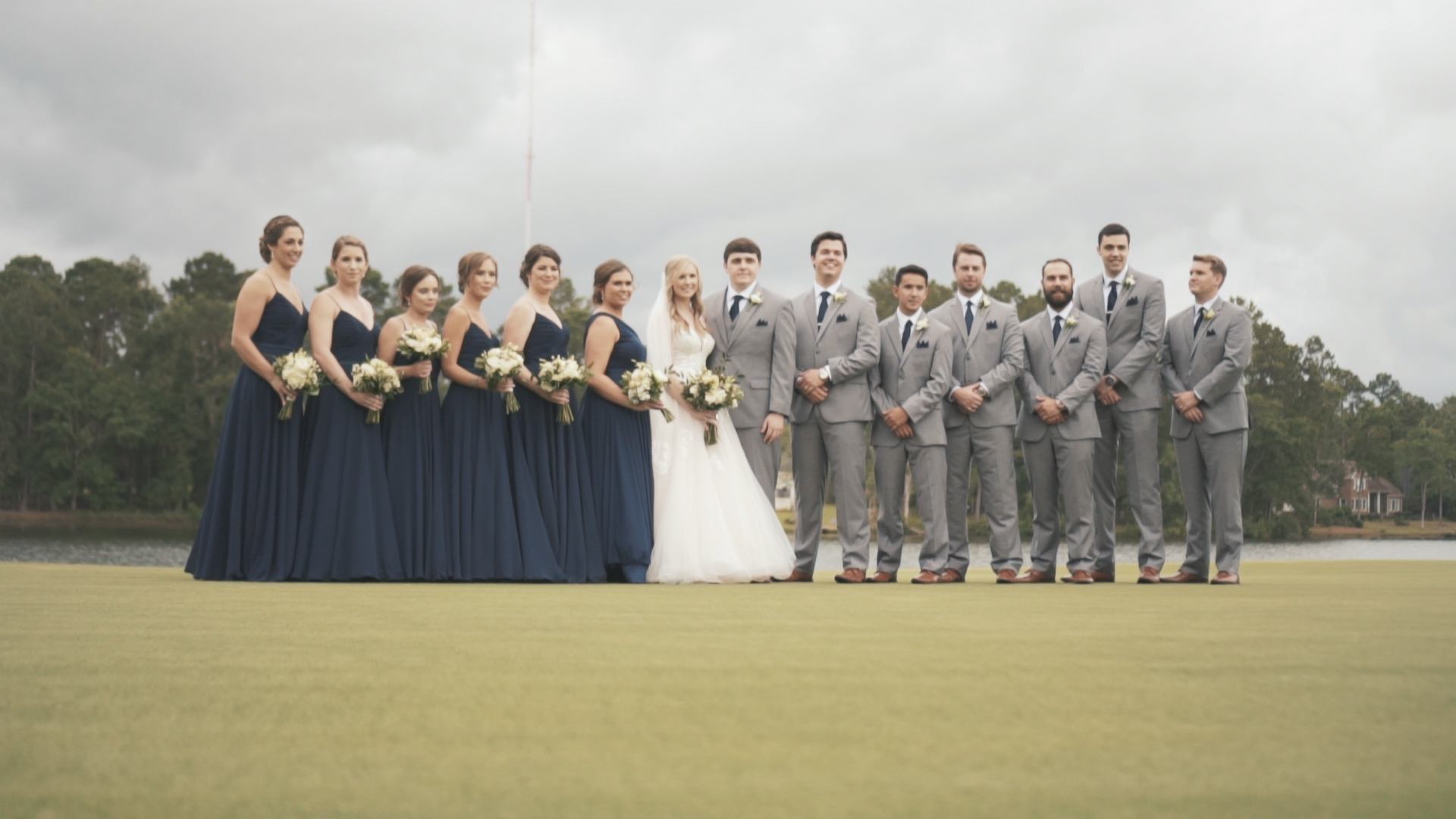 Beautiful bride and groom under umbrella on wedding day - minimalist, artsy shot.