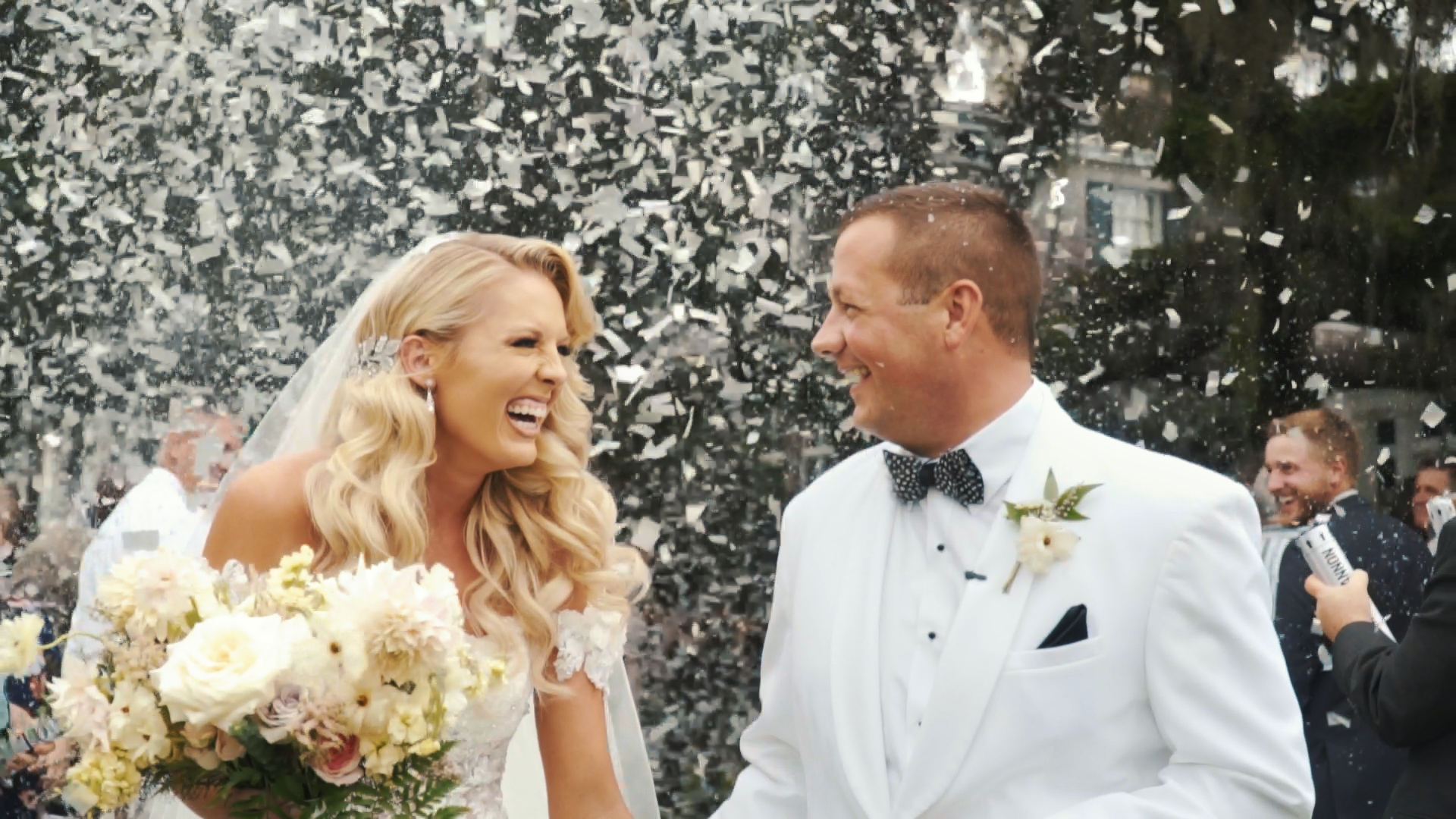 Bride and groom can't stop smiling after tropical wedding ceremony!