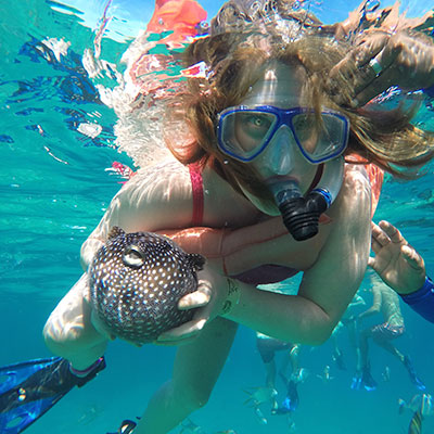Shanelle holding a pufferfish
